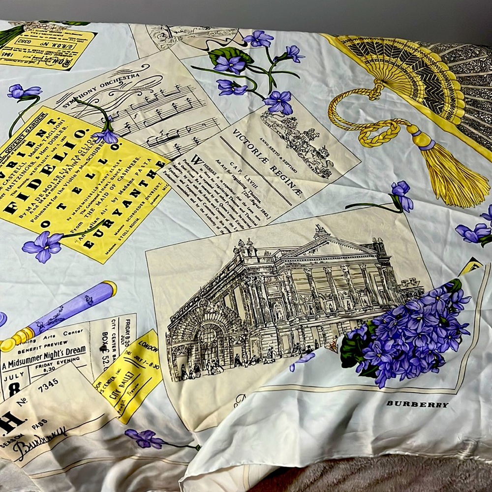 Burberry Scarfed Authentic in light blue background